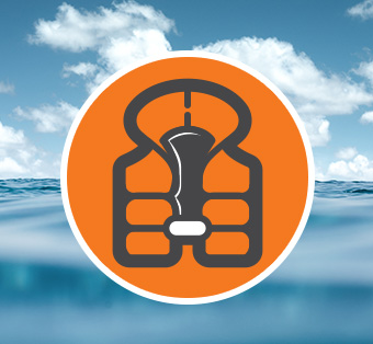 a man wearing a lifejacket holds another lifejacket in his right hand and signals the number one with his left hand